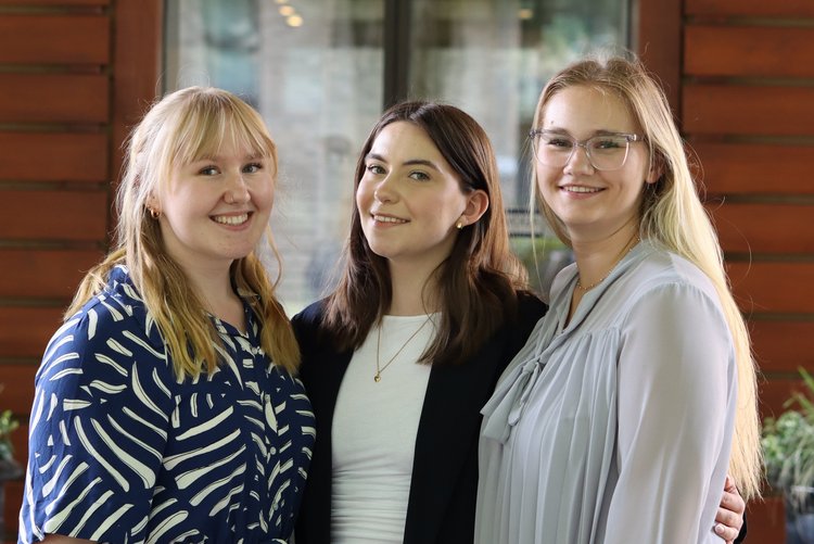 Event contacts at Park-Hotel Hagenbeck in front of the red wooden facade
