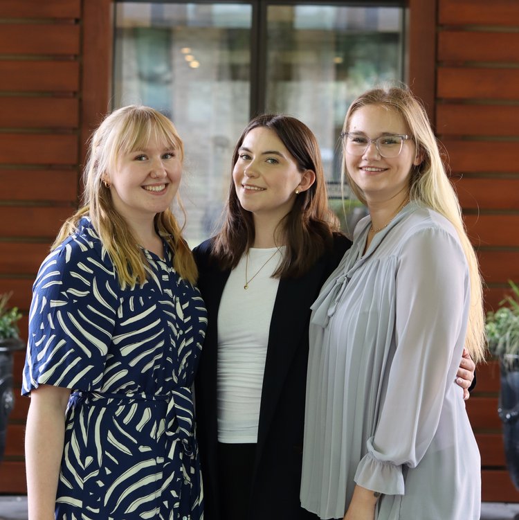 Event contacts at Park-Hotel Hagenbeck in front of the red wooden facade